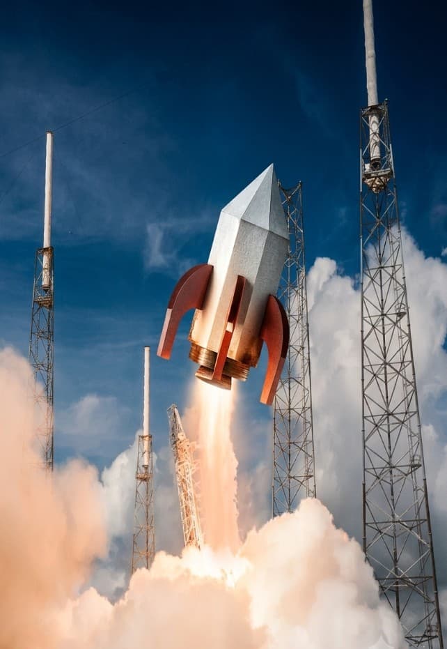 Cohete aeroespacial despegando desde la plataforma de lanzamiento